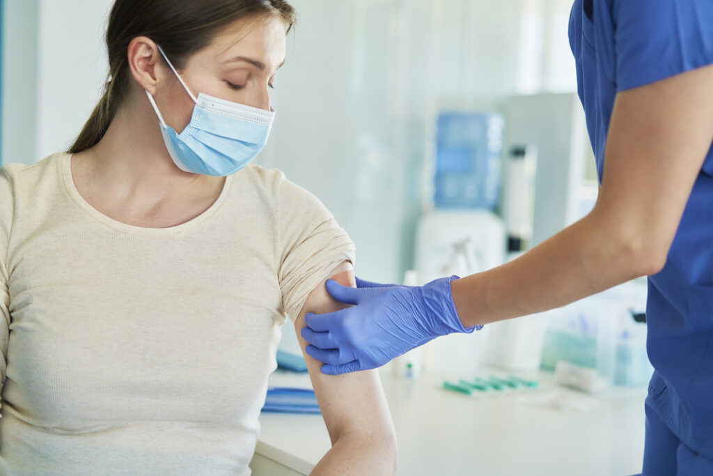 a lady meeting a health care provider for the treatment of staph infections