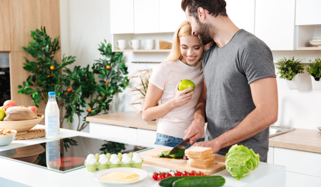 husband and wife happy over the outcome of using the right food for sperm count 