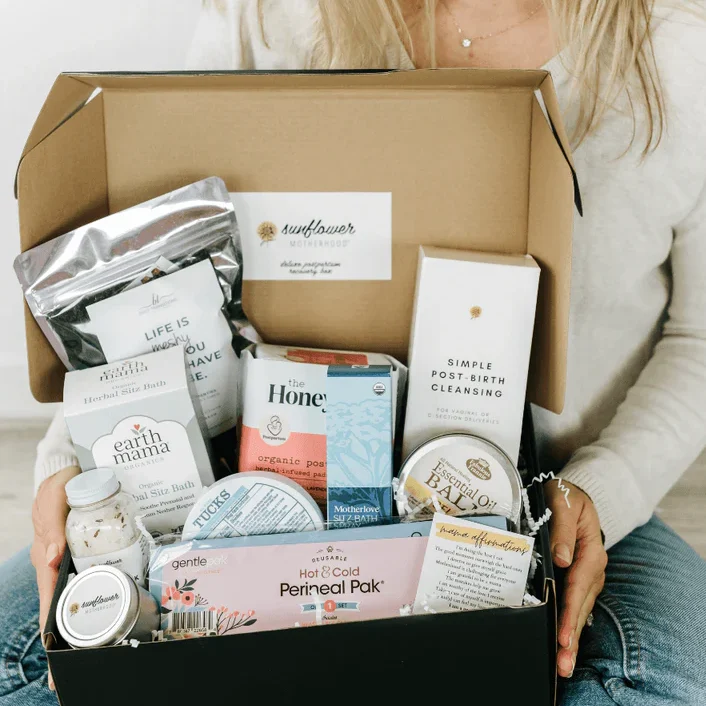 woman holding Postpartum Care Packages