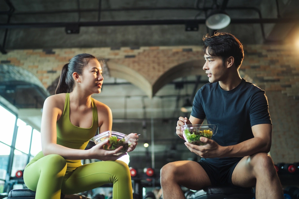 couples staring at each other while eating
