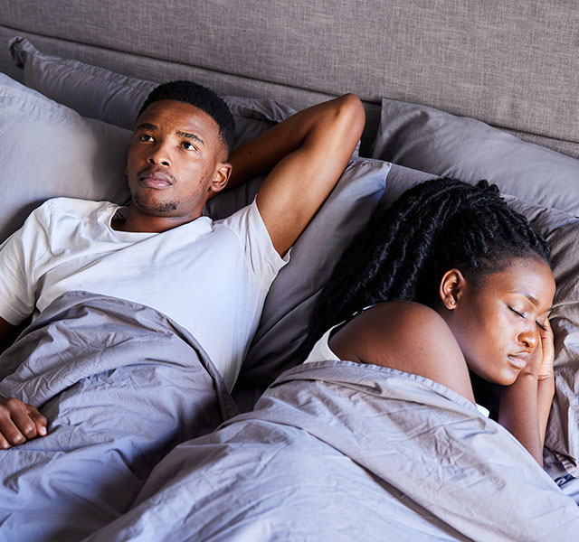 man suffering from insomnia