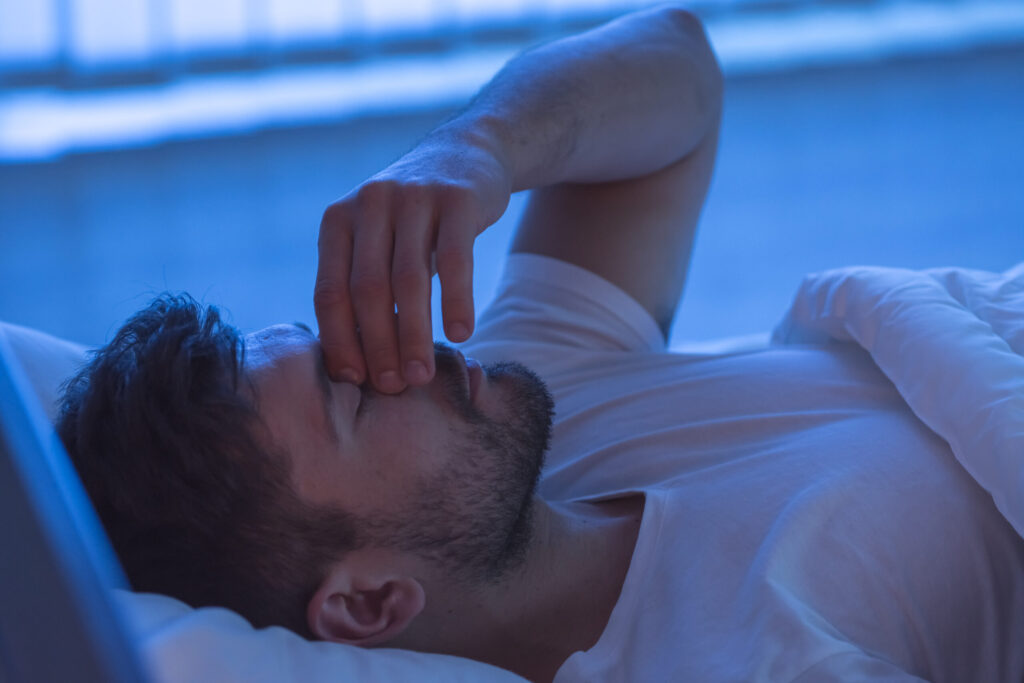 man unable to sleep