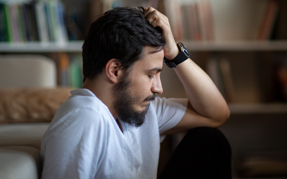 man worried about hormonal level