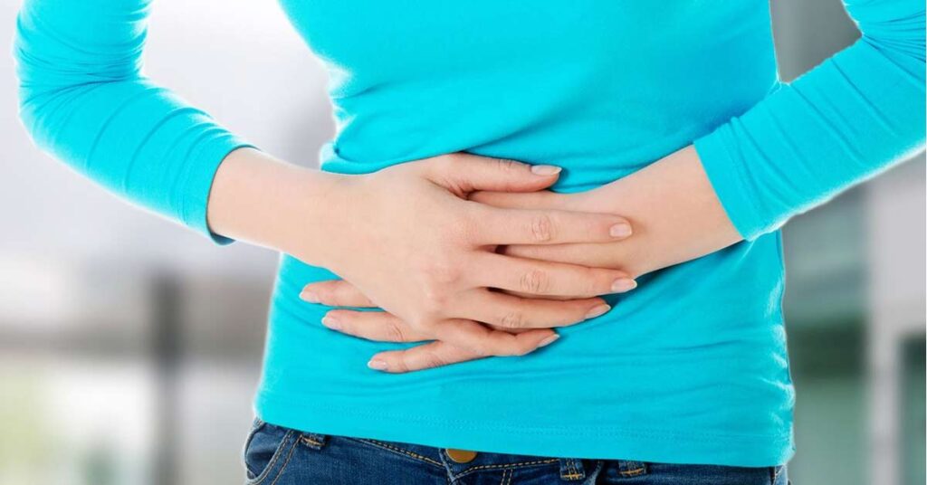 woman in pain due to pelvic organ prolapse