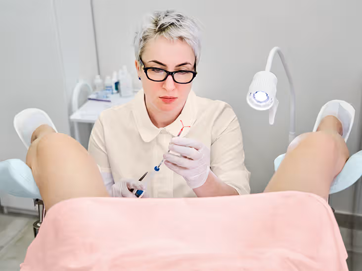 doctor implanting an iud