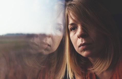 lady going through emotional shifts after switching pills