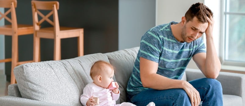 man feeling depressed after postpartum sleepless night