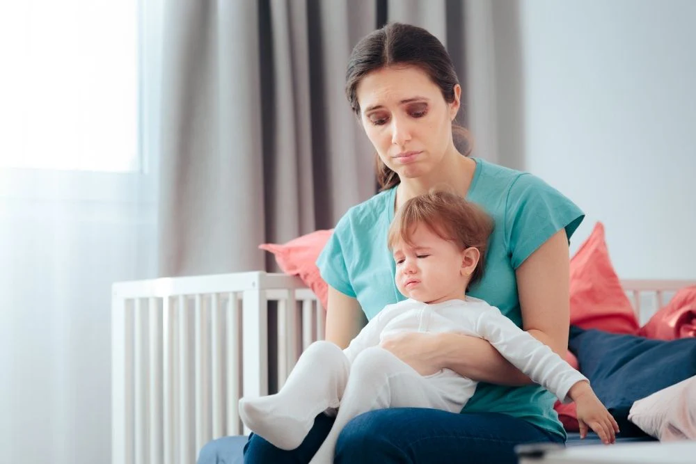 woman suffering from postpartum depression