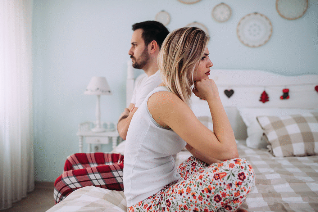 Young couples sitting sadly away from each other