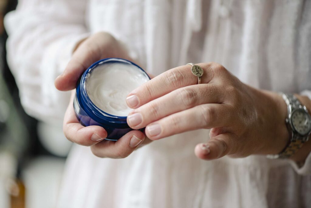 lady holding a moisturizer