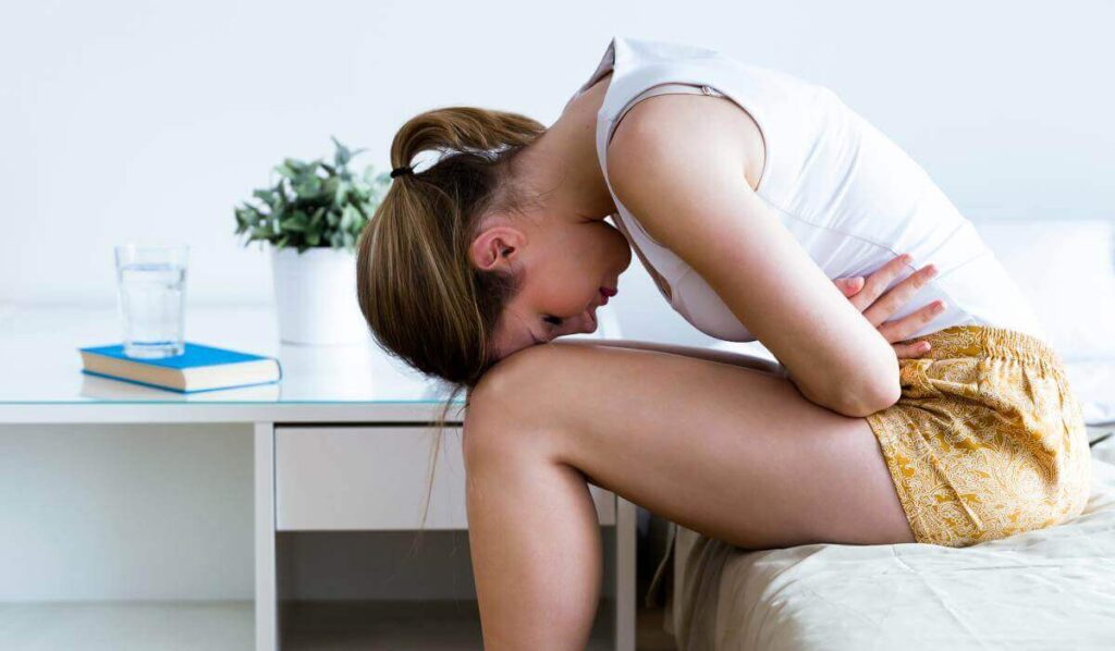 woman feeling pains due to genital pain disorder