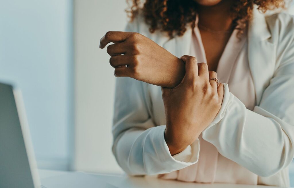 young lady holding her hands