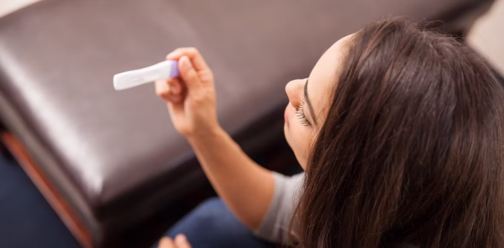 lady testing for pregnancy