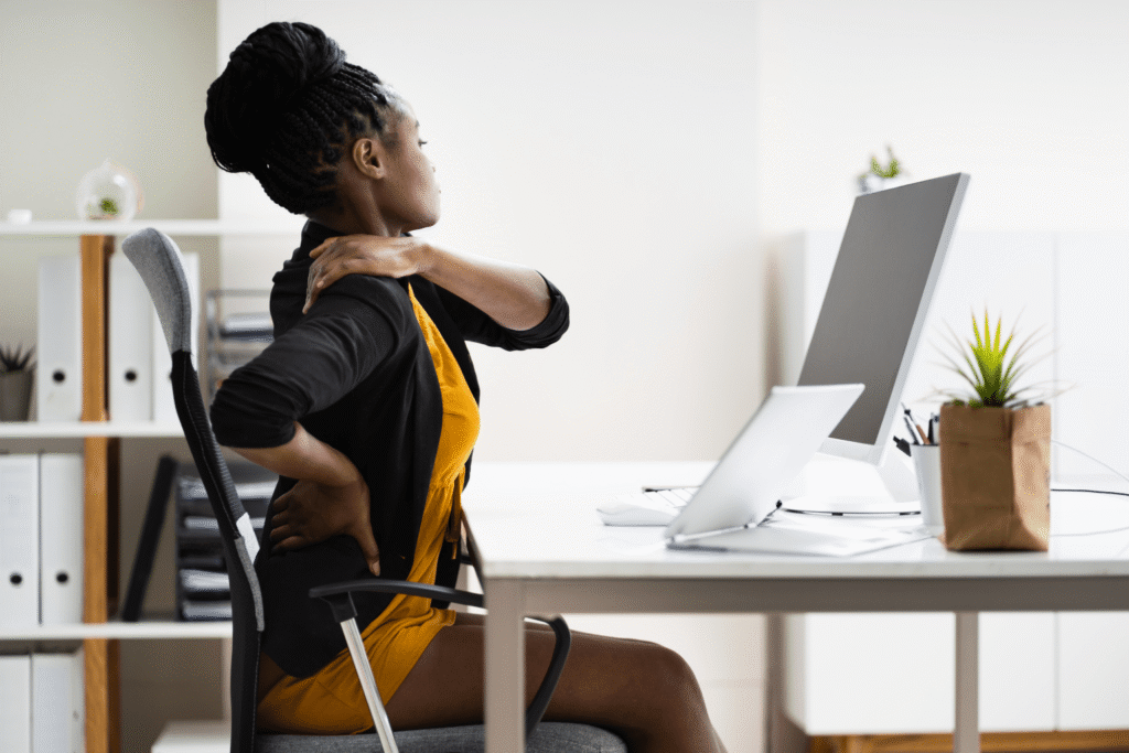 young lady experiencing back pain due to pudendal neuralgia