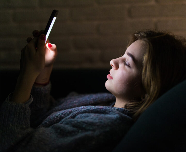 young girl on her phone 