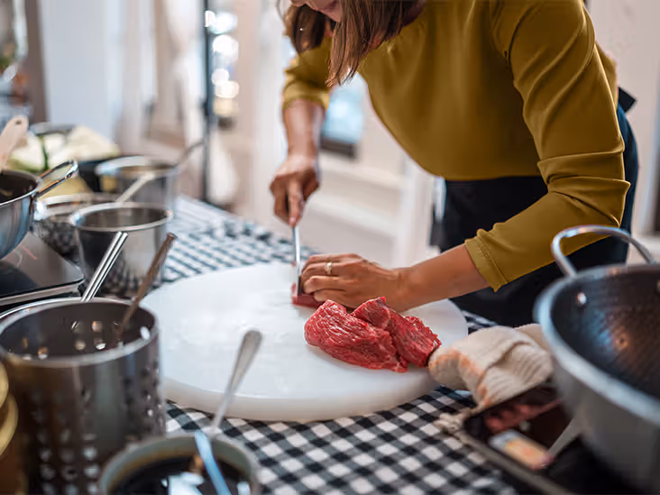 woman dicing beef