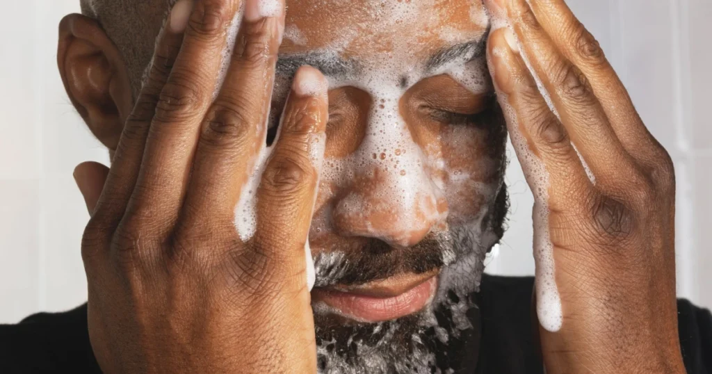Man exfoliating
