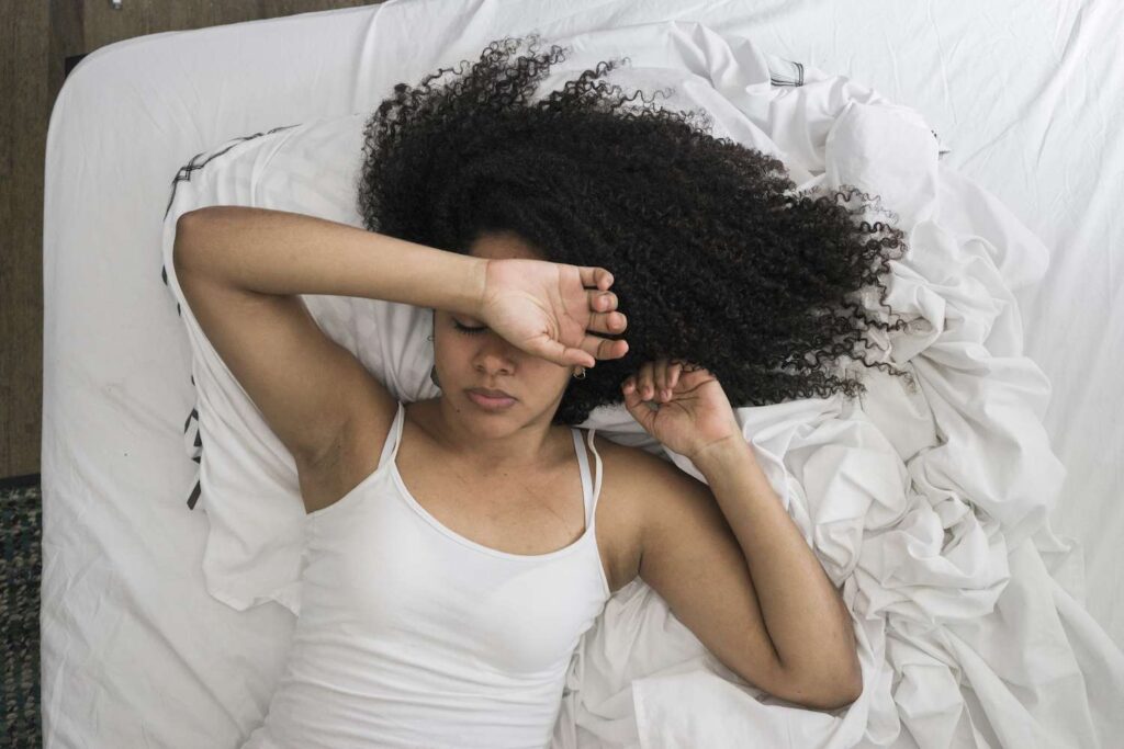 woman experiencing spotting after unprotected sex